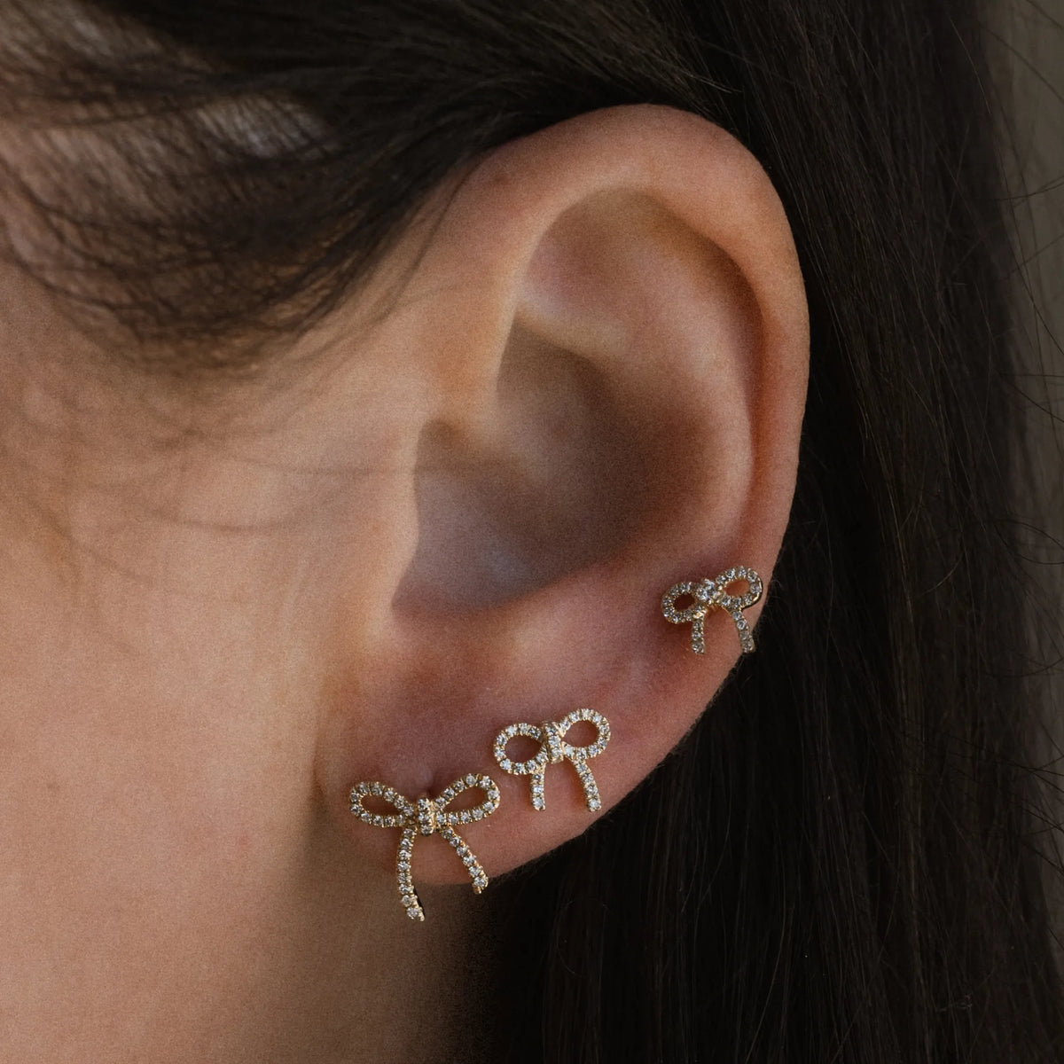 14k yellow gold diamond bow stud earrings, bow shaped diamond studs by Mama Bijoux, Costa Mesa Orange County jewelry