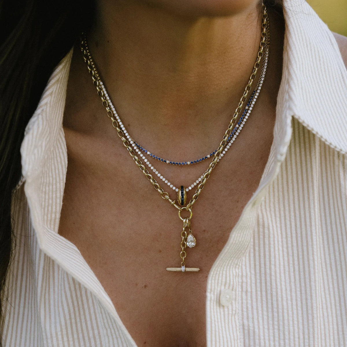 Diamond toggle necklace charm styled on layered gold chain necklaces, 14k yellow gold, Mama Bijoux Costa Mesa Orange County jewelry