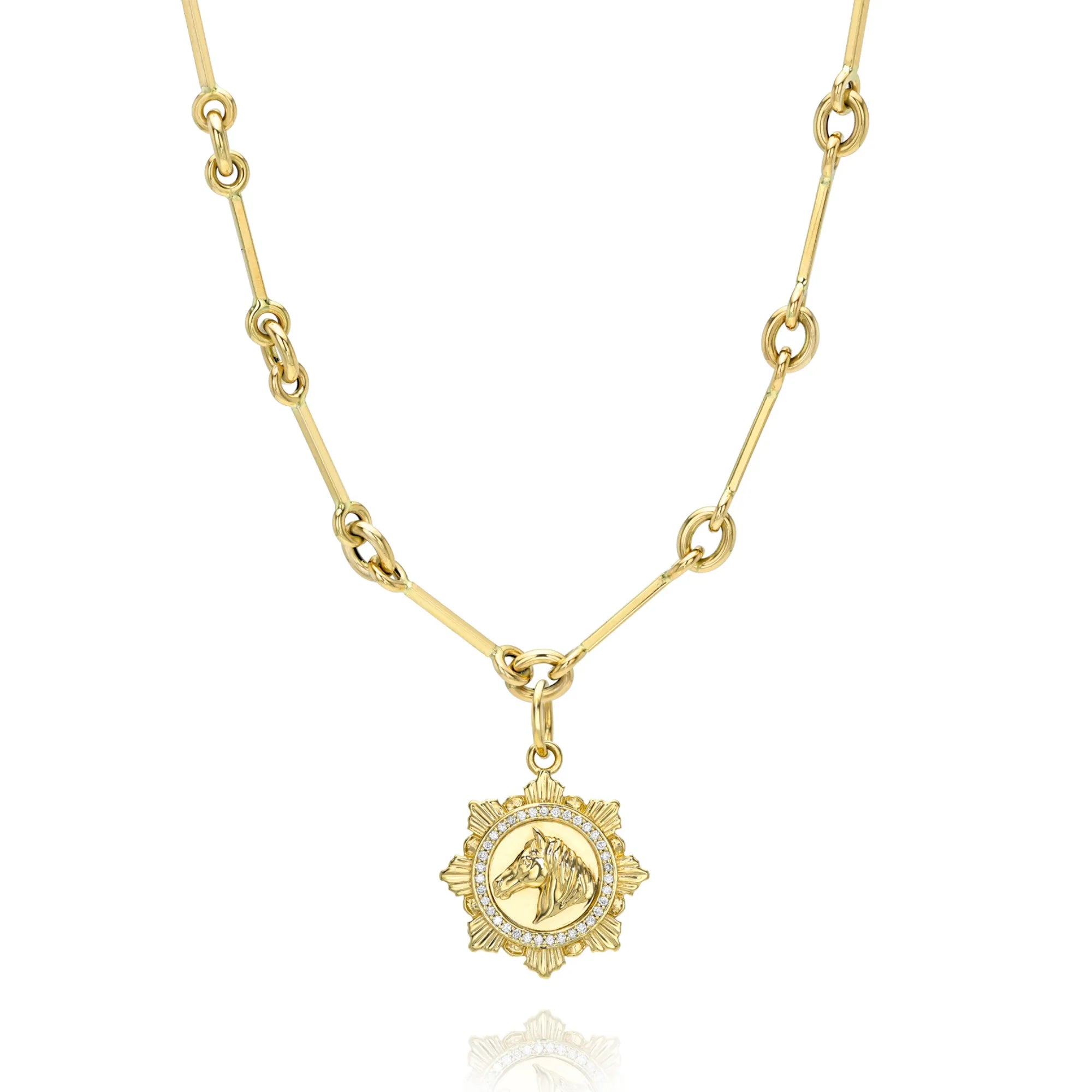 horse charm with horse bit chain on white background