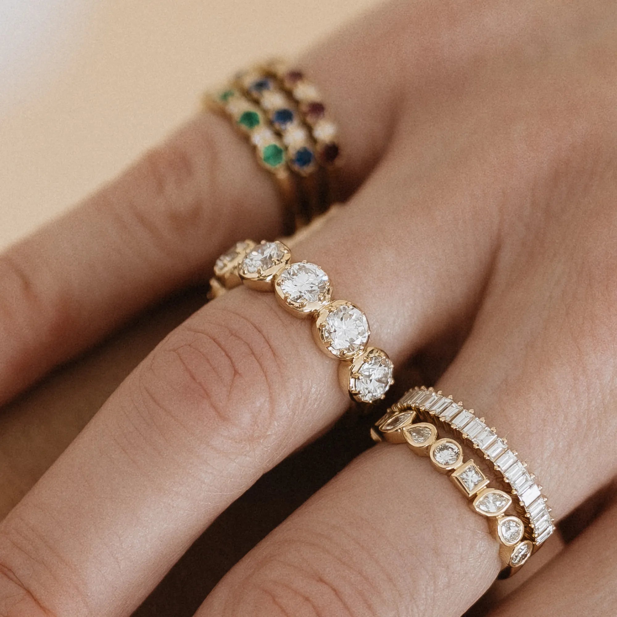 Classic Georgian set diamond eternity band in curated ring stack with mixed cut diamond bands and multicolor gemstone birthstone rings 14k yellow gold Mama Bijoux Costa Mesa