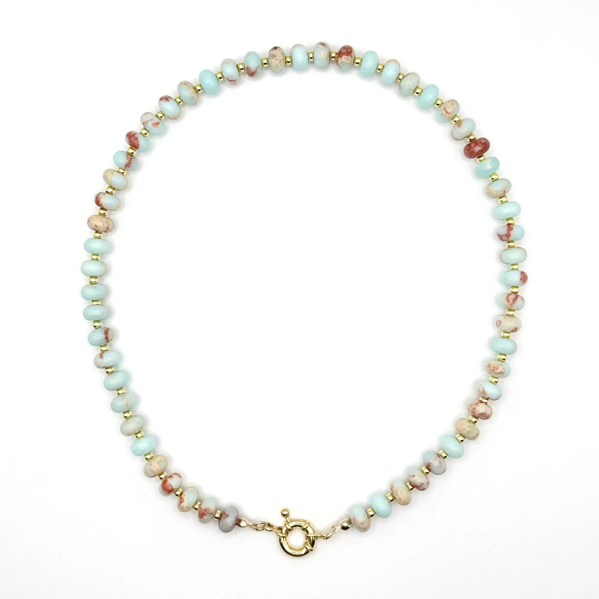 Desert Rose beaded necklace by Mama Bijoux x Isla Sol featuring natural Shoushan stone beads in pale blue and warm sand tones with 18k gold spacers and a gold filled clasp.
