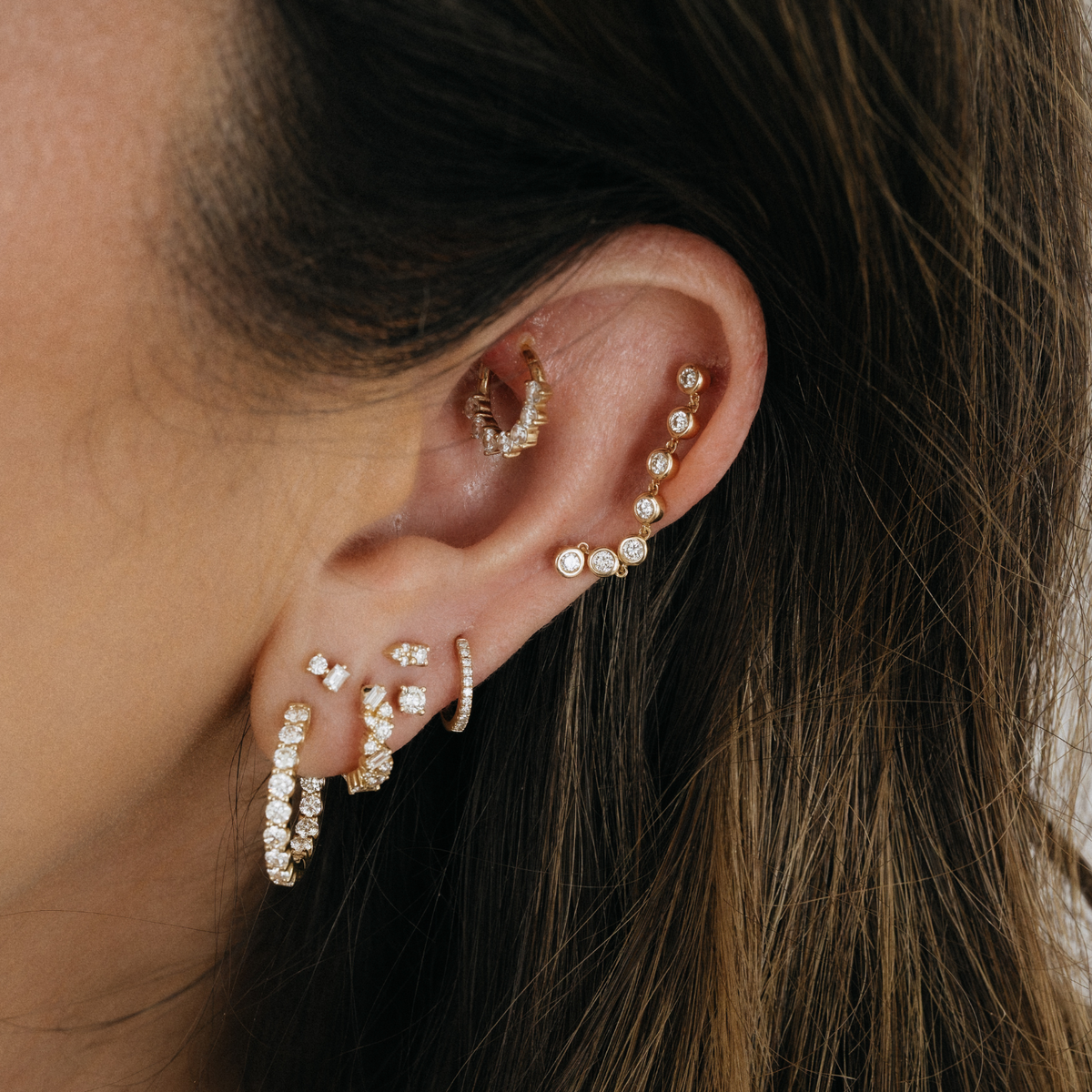 Gold and diamond earrings 14k yellow gold natural diamonds dainty diamond hoop earrings diamond stud earrings curated ear stack everyday fine jewelry meaningful jewelry gift anniversary jewelry Mama Bijoux Costa Mesa