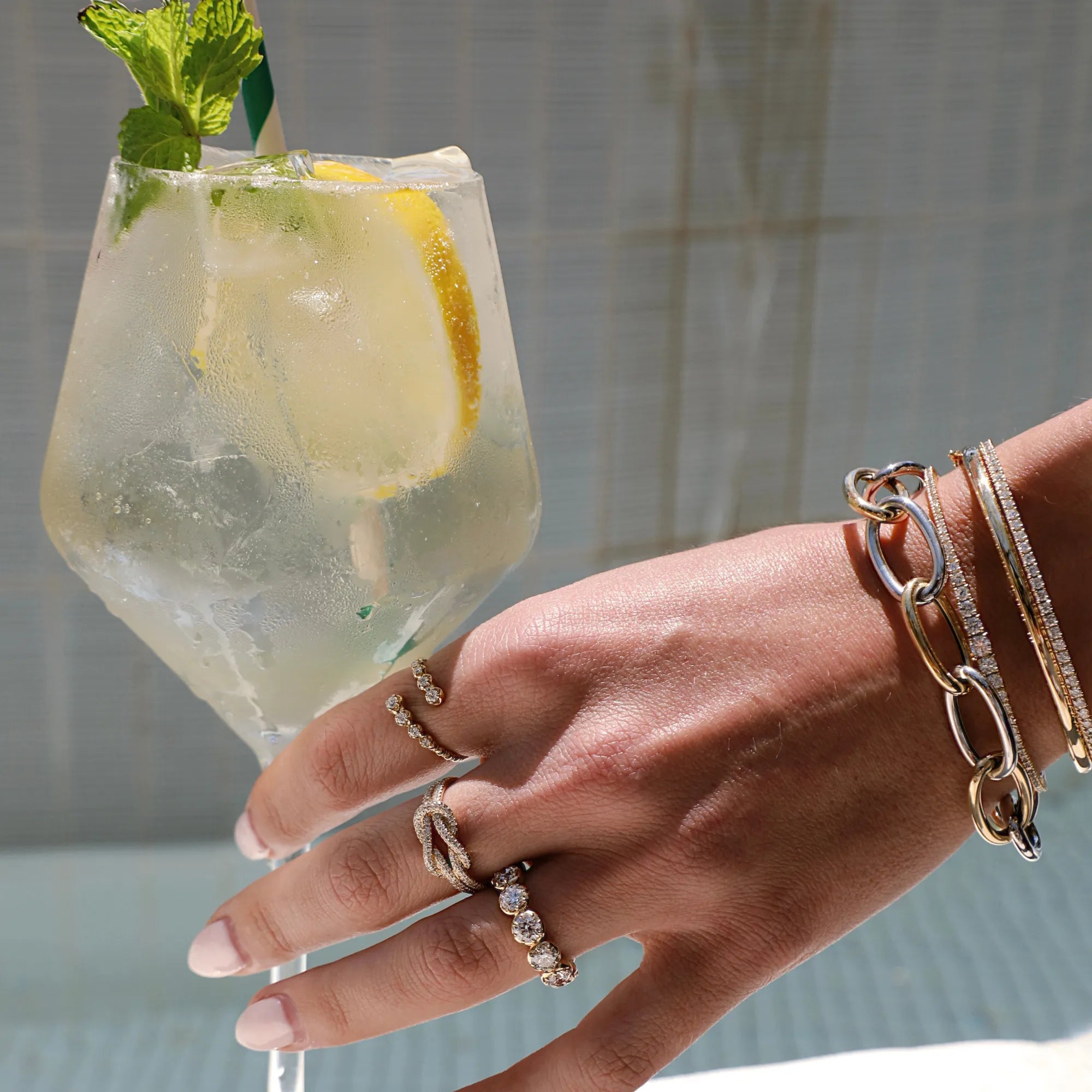 Gold diamond stacking rings and layered luxury bracelets styled for everyday fine jewelry featuring stackable gold rings, modern heirloom jewelry, diamond eternity bands, minimalist gold jewelry, and timeless pieces designed to become part of your signature jewelry stack