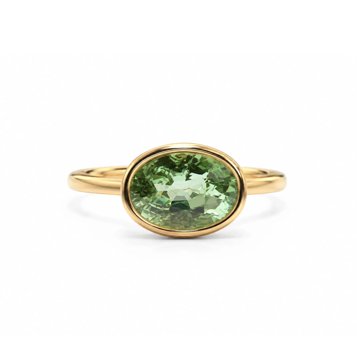 One-of-a-kind lime green tourmaline ring with east-west bezel setting in polished gold, luxury fine jewelry