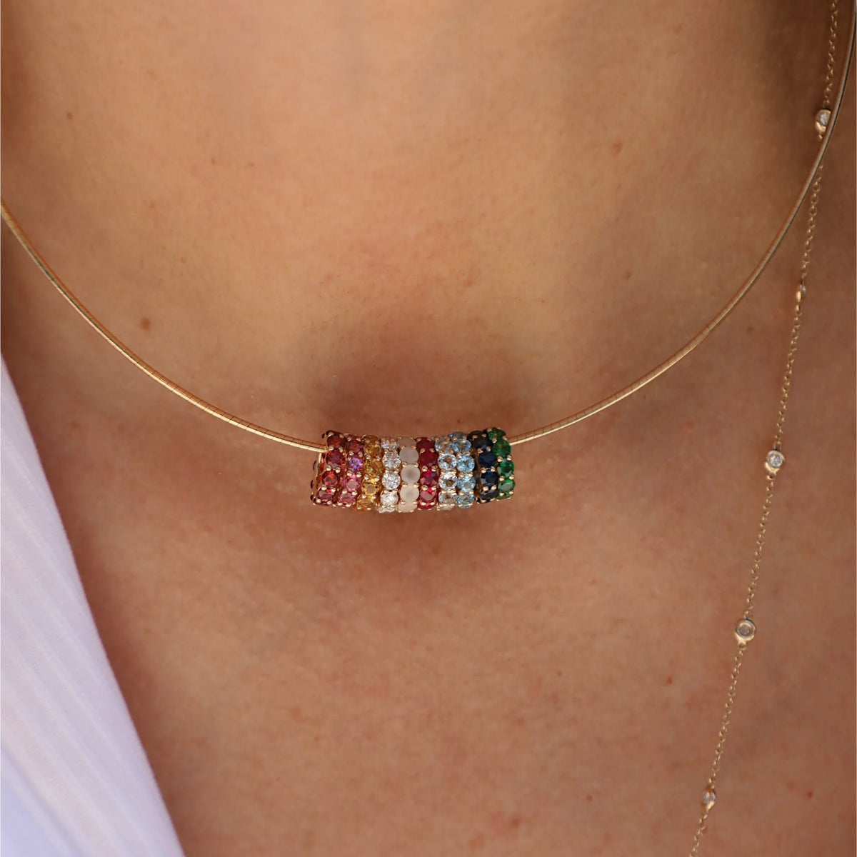 September Birthstone Bead (Sapphire) worn with rainbow birthstone charm beads on a gold wire necklace