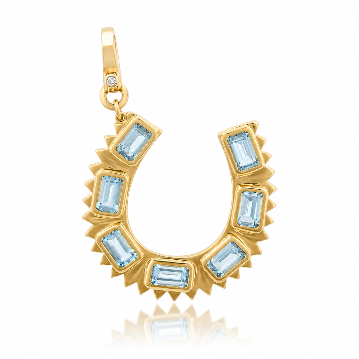 14k solid yellow gold horseshoe charm with natural blue topaz stones, lucky charm necklace piece handcrafted in Mama Bijoux Costa Mesa atelier