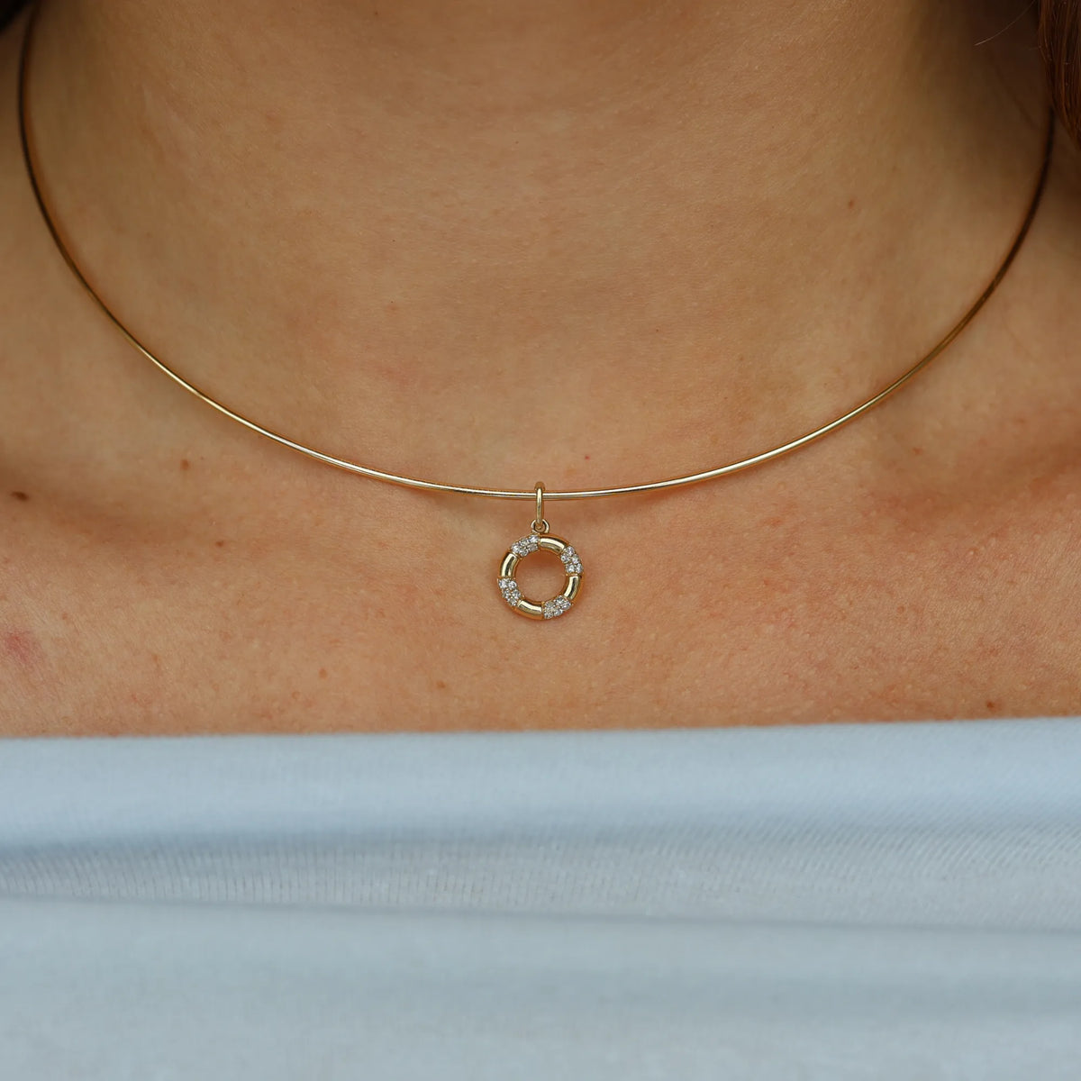 14k yellow gold diamond life saver charm worn close on the collarbone, nautical pendant necklace from Mama Bijoux fine jewelry, Costa Mesa California
