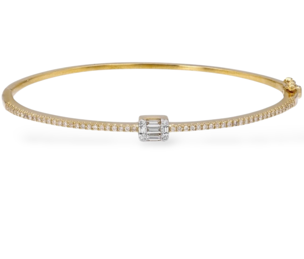 Bangle with a row of diamond baguettes in a sleek gold band. Mama Bijoux Fine Jewelry 14k Yellow Gold 