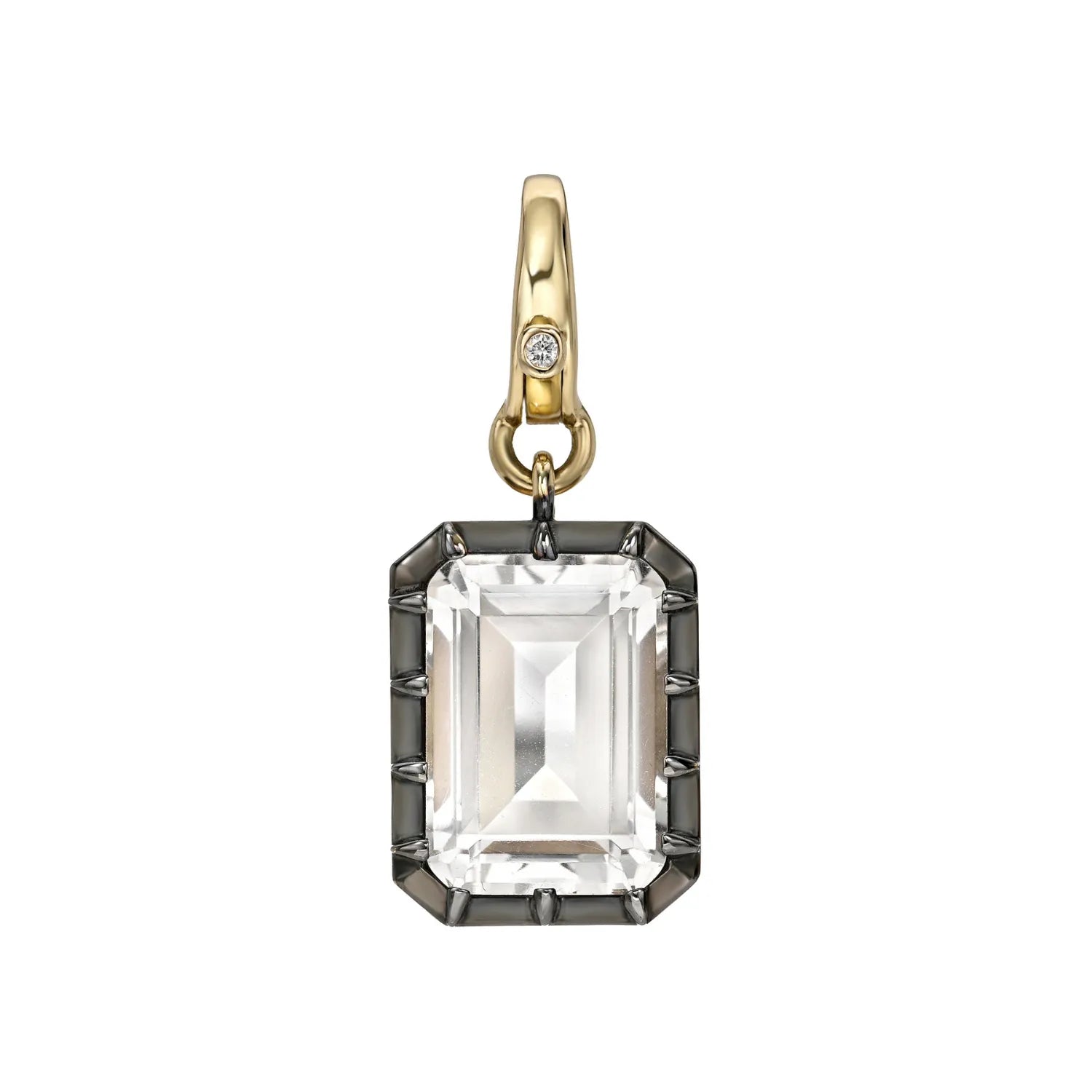 Gold and silver pendant with a large clear gemstone on a white background