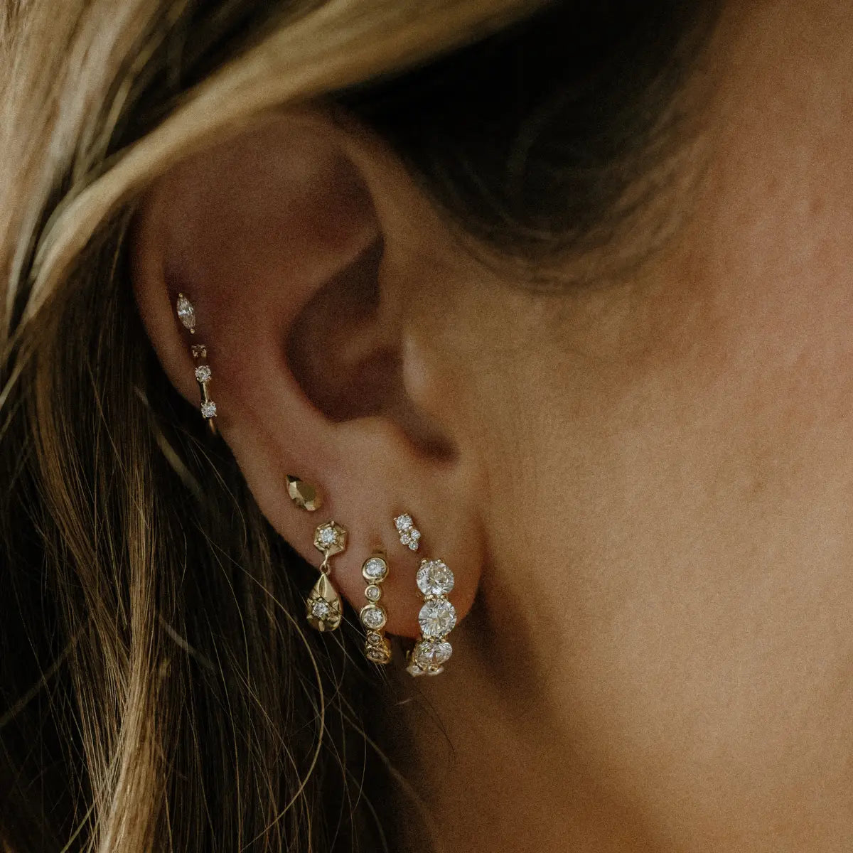 She’s Perfect Shared Prong White Topaz Huggies Mama Bijoux Fine Jewelry 14k yellow gold natural white topaz