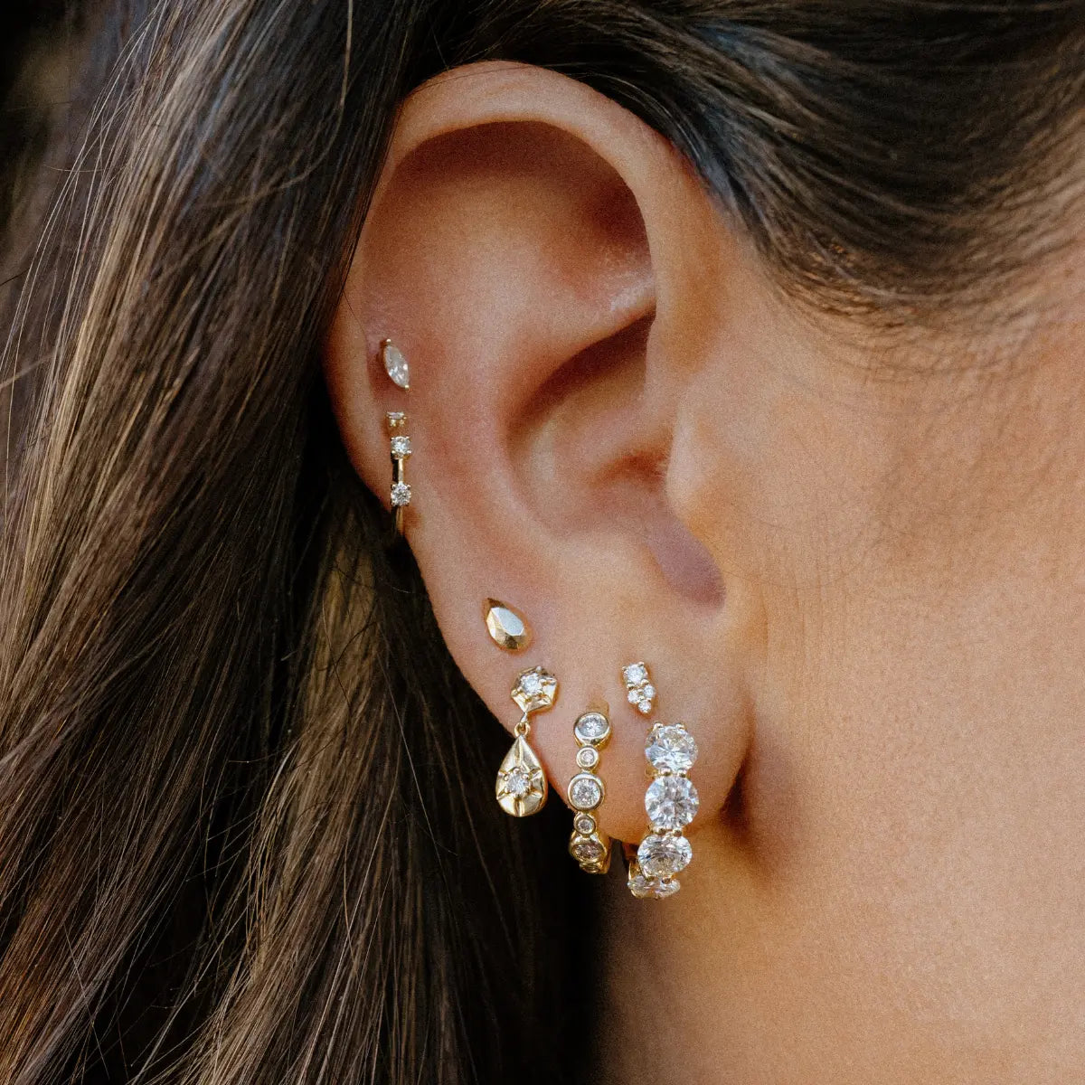 She’s Perfect Shared Prong White Topaz Huggies Mama Bijoux Fine Jewelry 14k yellow gold natural white topaz