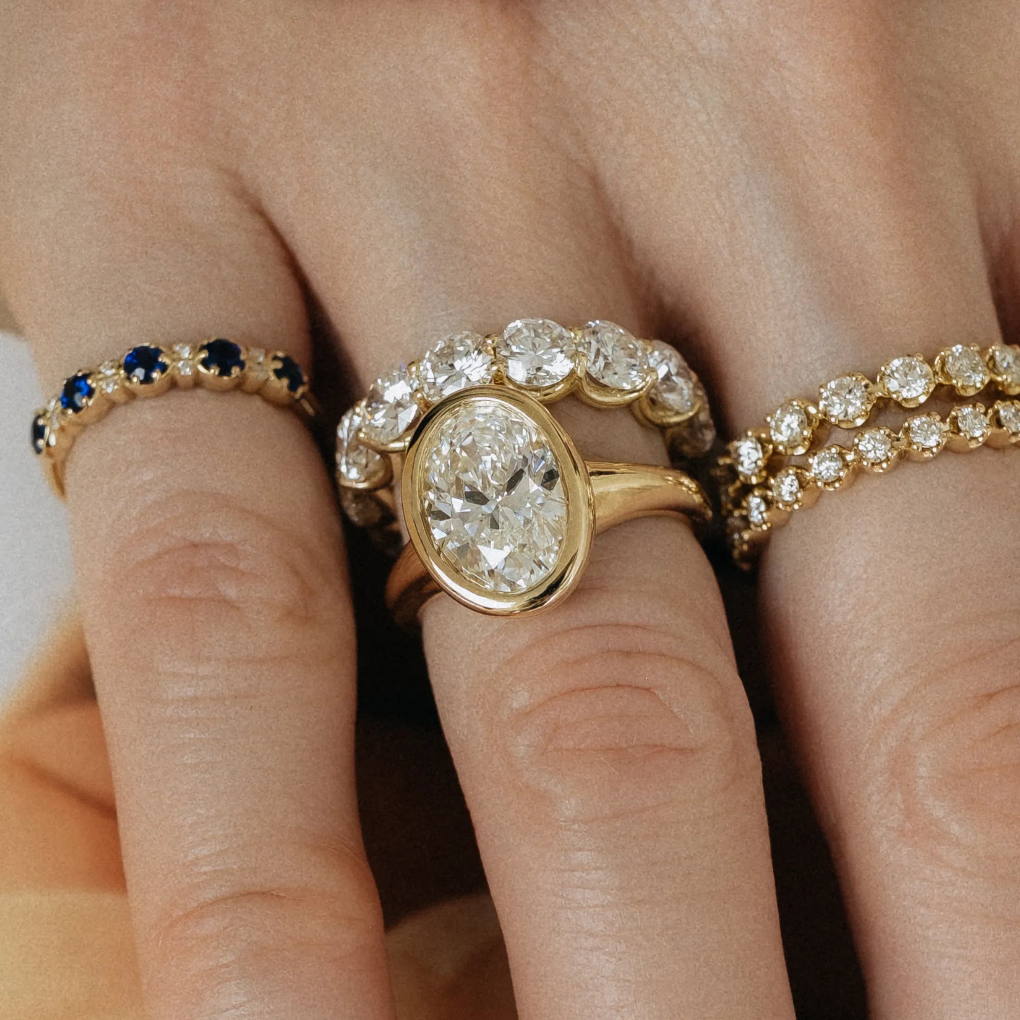 Bezel set oval diamond engagement ring 14k yellow gold 3.07ctw F VS1 IGI certified lab grown diamond oval engagement ring yellow gold bridal set Mama Bijoux Costa Mesa
