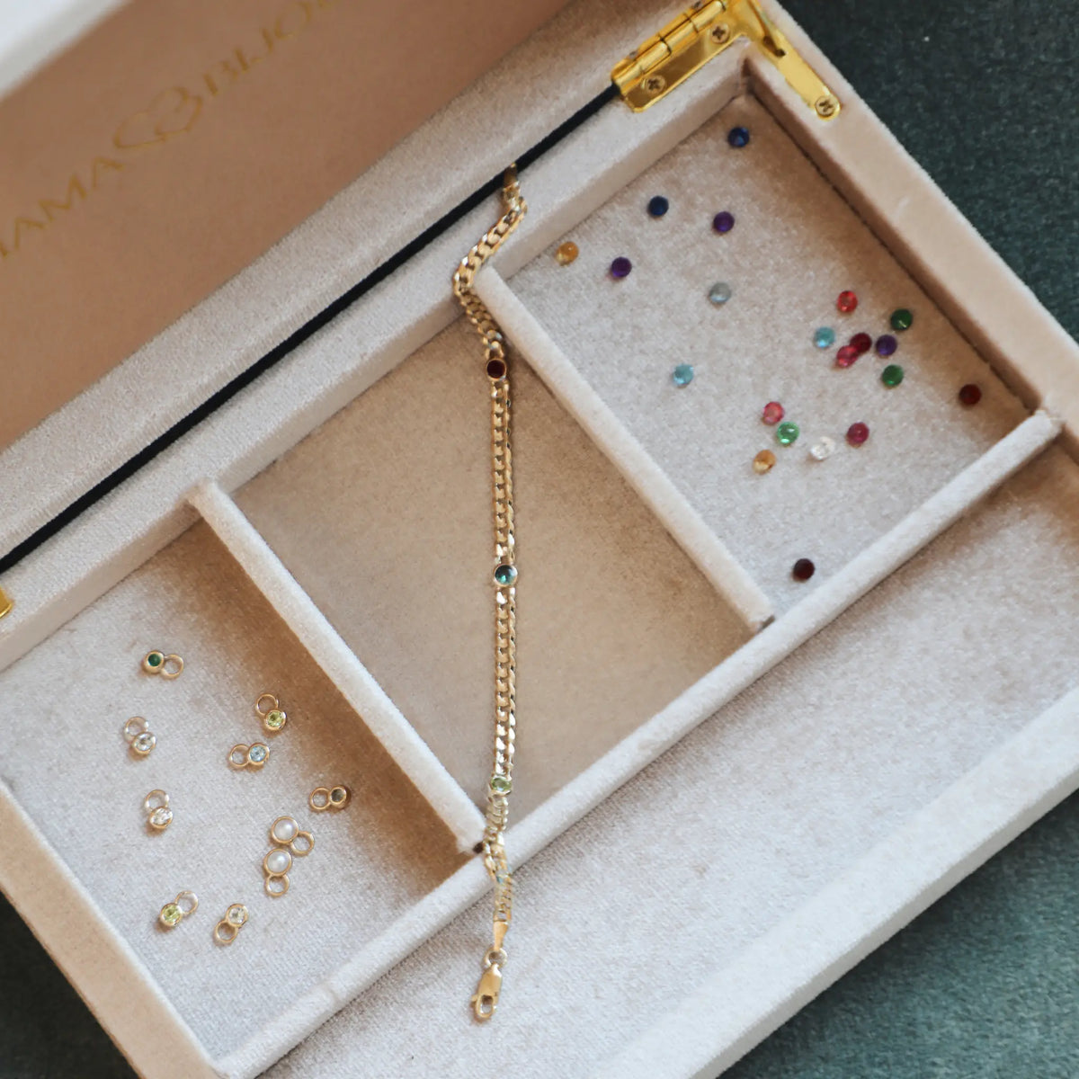 14k yellow gold custom birthstone bracelet on white background, Mama Bijoux Costa Mesa