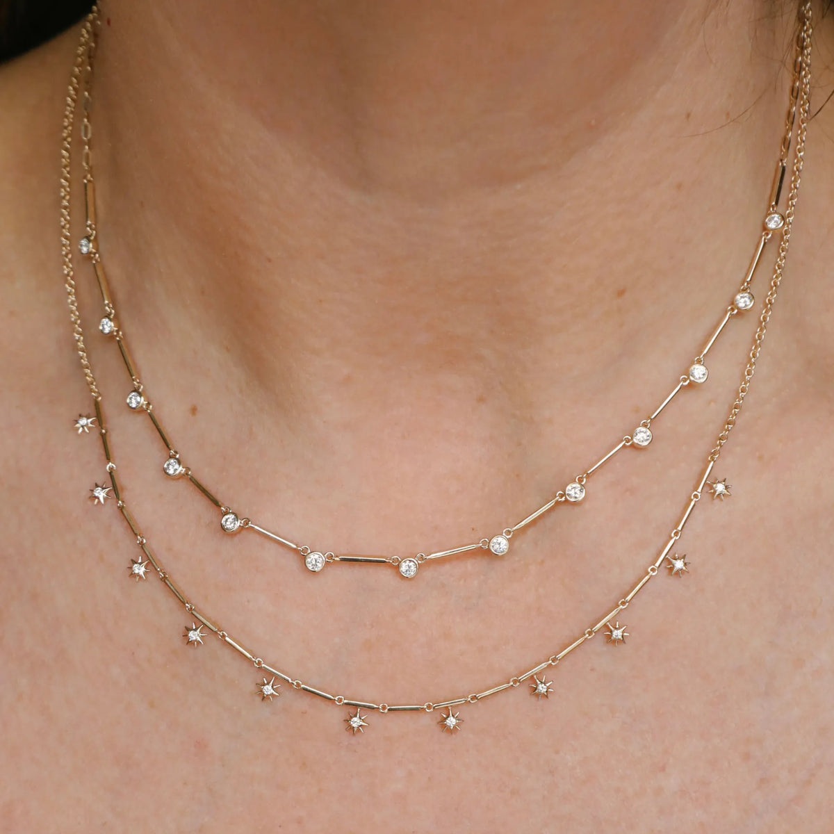 Diamond bar tennis chain necklace layered with diamond star necklace, gold layering necklaces, dainty necklace stack, Costa Mesa fine jewelry