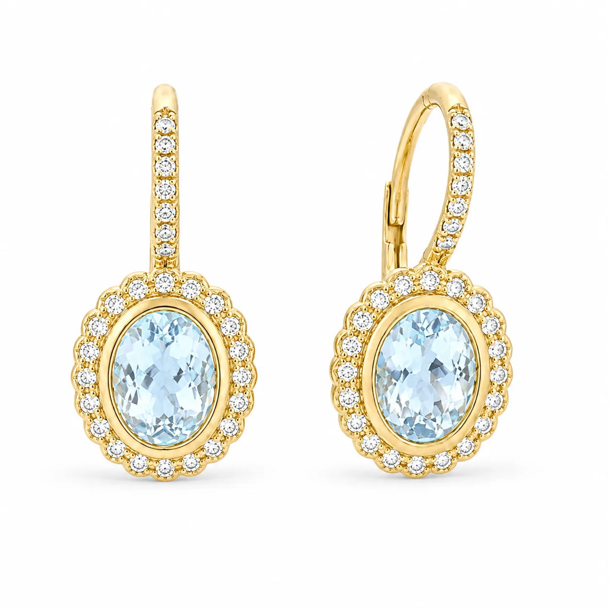 Emerald-cut aquamarine drop earrings surrounded by natural diamonds in an elegant fine jewelry setting