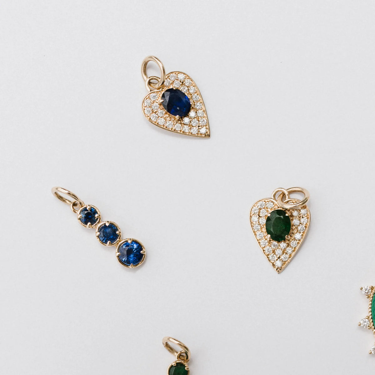 14k yellow gold pave diamond heart charms in emerald and blue sapphire, gemstone charm necklace options by Mama Bijoux Costa Mesa