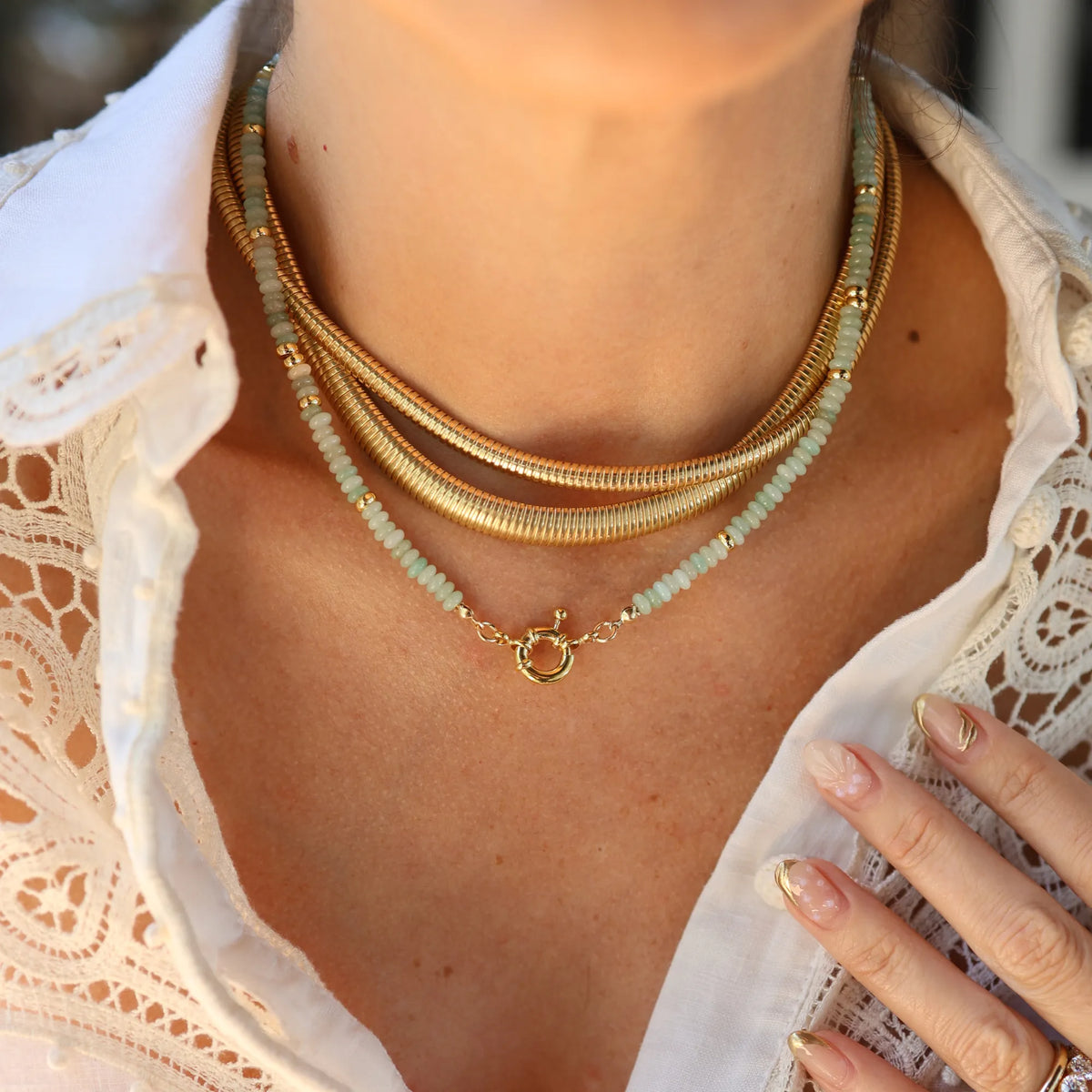 Layered styling of the Mama Bijoux x Isla Sol So Shellegant Amazonite Beaded Necklace with solid gold chains.