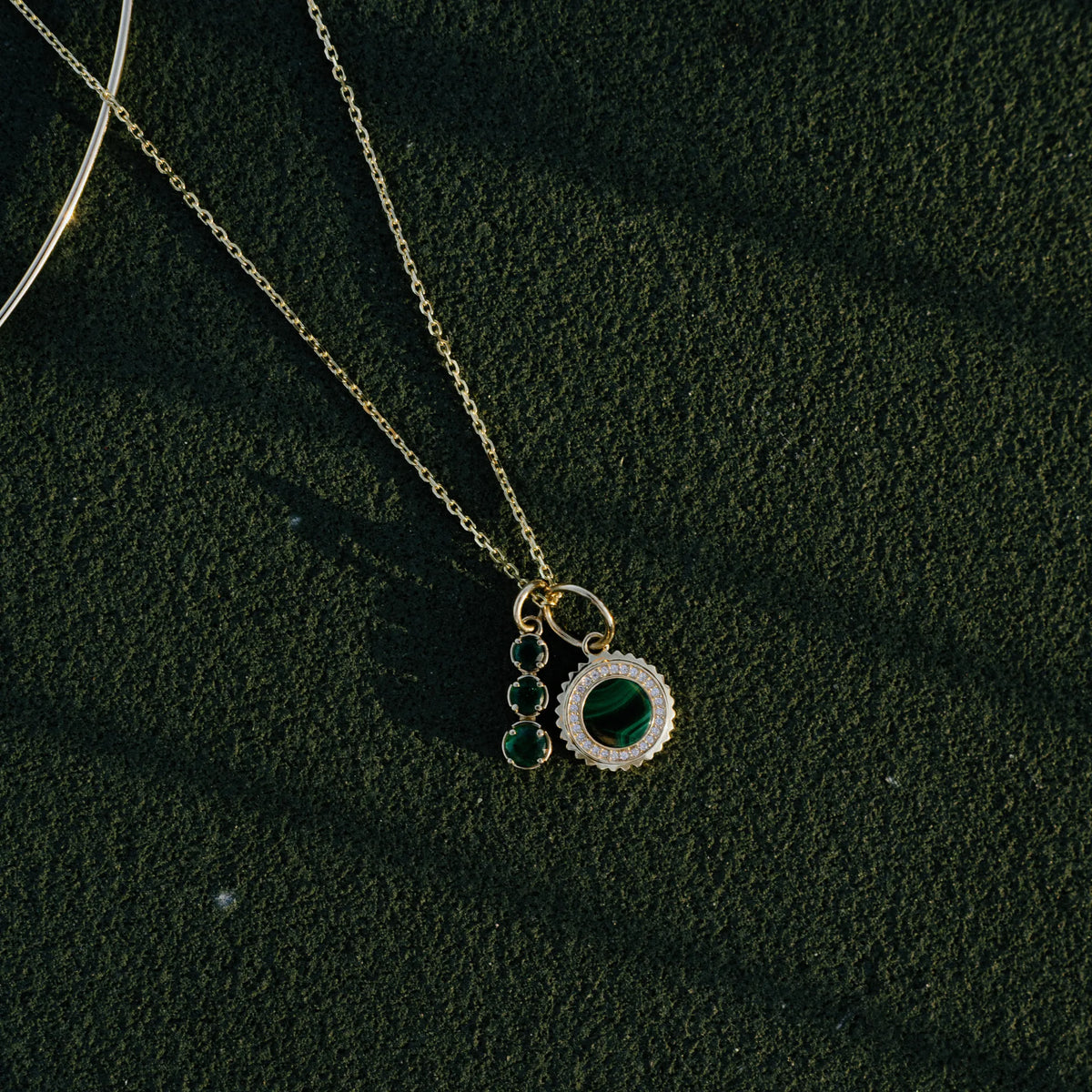 14k yellow gold malachite medallion charm necklace close up, charm necklace by Mama Bijoux Costa Mesa