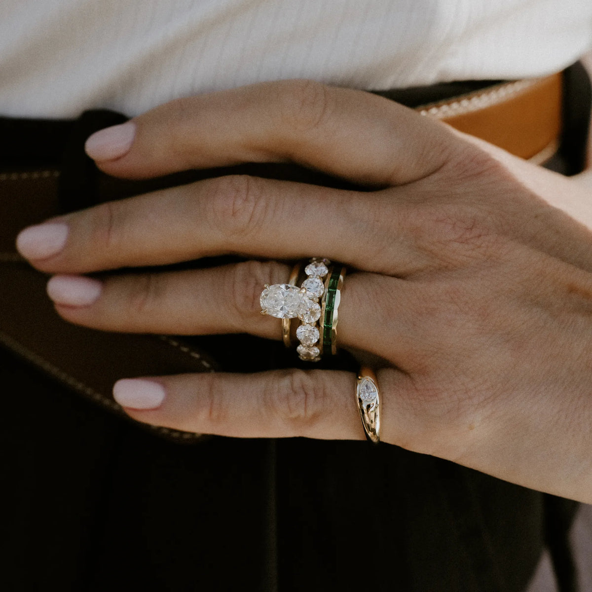 14k yellow gold pear lab diamond pinky ring stacked with gold rings, ring stacking style by Mama Bijoux Orange County