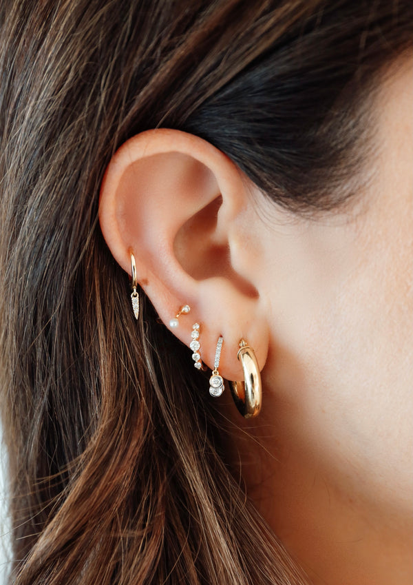 diamond single prong huggie earring 14k solid gold mama bijoux ear piercing styling ear stack 